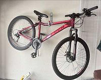 Full side view of CCM Slope bike showing frame, wheels, drivetrain and suspension fork