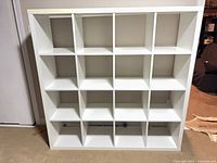 Front view of 16-cube shelving unit