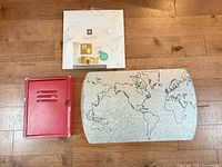 All three items: key cabinet, world map décor, dry erase board packaging