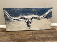 Front view of framed steer head canvas print