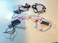 Two Laser X shooters, two chest sensors