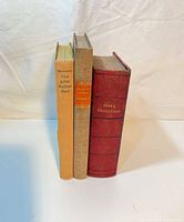 Spine view of three hardcover gardening books