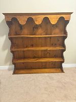 Front view showing full 4-tier pine shelf