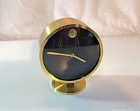 Front view showing dial, hands and overall appearance