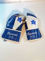 Front view of both Banner ML-2 glove and blocker with Toronto Maple Leafs logos