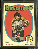 Front of 1971-72 O-Pee-Chee NHL hockey card featuring Reg Leach in Boston Bruins uniform, showing some wear and creases.