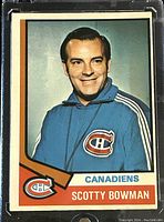 Front side of the 1974-75 O-Pee-Chee Scotty Bowman Montreal Canadiens NHL Hockey Trading Card showing Scotty Bowman in a blue Canadiens jacket.