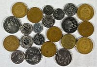 Top view of 21 Netherlands coins in mixed silver and brass colors showing various designs including royal portraits and numeric denominations