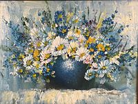 Close-up of the oil painting showing daisies, small blue and yellow flowers in a blue vase with textured blue background.