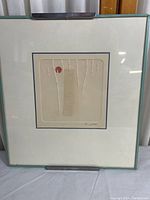 Full view of framed modern abstract paper artwork showing the entire piece and frame.