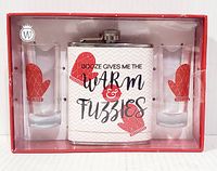Full set in box showing flask and two shot glasses with mitten design and text on flask.