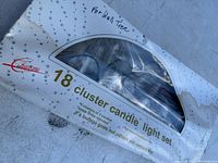 Box front showing 18 cluster candle light set designed for wall tree