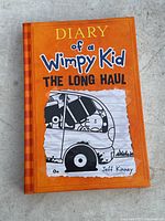 Front cover of Diary of a Wimpy Kid: The Long Haul book showing the title, author, and illustration.