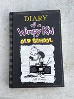 Front cover of the book showing title, author, and cartoon image of the character with a radio.