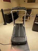 Front view of Bowflex Tread Climber treadmill showing walking belt and base.