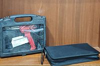 Two soldering kits including a Weller heavy duty soldering iron kit in hard plastic case and a smaller soldering iron kit in a fabric case.