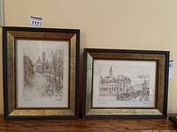 Pair of framed engravings displayed side-by-side, showing the full artwork and frames.