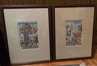 Pair of framed watercolour paintings depicting Quebec city street scenes in brown wooden frames with mattes, approx. 17x13 inches frames.