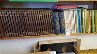 Full shelf view of the collection showing The Old West Time Life brown hardcover volumes with gold lettering on the spine alongside other books on upper shelf