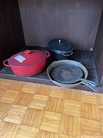 All four cast iron cookware pieces together