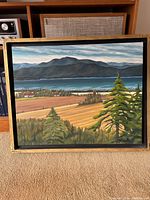 Full frontal view of painting in frame