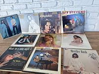 Photo showing the front covers of all 10 vinyl albums arranged in two rows, featuring a variety of artists and styles.