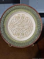 Front view of Irish Family Plate showing detailed Celtic knot design, shamrocks, and prayer inscription.