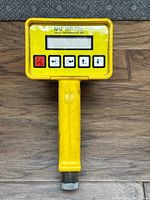 Front view of yellow handheld NDT WP-725 probe with digital screen and control buttons.