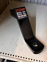 Front and side view of the Curt Class 3 Ball Mount showing weight ratings and usage information label. Black finish and ball mount hole visible.