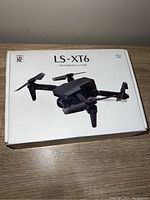 Original box of Lasenxi LS-XT6 mini drone with camera