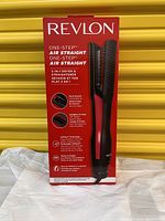 Front of the box showing branding, model name, and product features detail