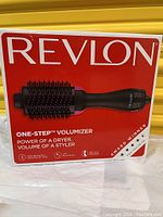 Box front showing the product image and branding with features noted such as 'One-Step Volumizer', 'Power of a dryer, volume of a styler', and award winner tag.