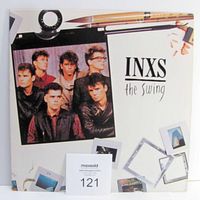 Front jacket cover of INXS The Swing vinyl LP album showing band photo and album title.