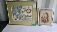 Two framed artworks side by side; the larger is the South Wales map, the smaller is the Common Buzzard print.