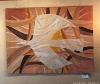 Front view of full leather mosaic artwork hanging on wall