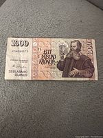 Front side of Iceland 1000 Kronur banknote showing portrait and denomination details.