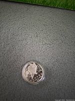 Obverse side showing the turtle design, inscriptions 'CANADA' and '50 DOLLARS'.