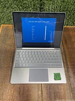 Open laptop showing Windows region selection screen