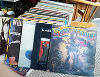 Vinyl records from various artists with visible titles including Molly Hatchet, Cleo Laine, and William.