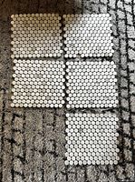 Top view showing six square 12"x12" sheets each with uniform white polished circular penny round marble tiles arranged in a grid.