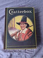 Front cover of the book 'Chatterbox' showing illustrated man with musket and decorative border