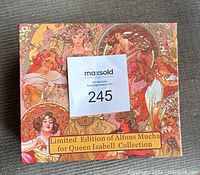 Box exterior with colorful Alfons Mucha art and label Limited Edition of Alfons Mucha for Queen Isabell Collection