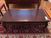 Full top view of rectangular coffee table showing wood grain and finish