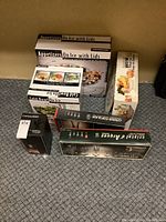 View of the boxed serving dishes for appetizers and cold trays on ice, assorted boxes including lids and cold bowls