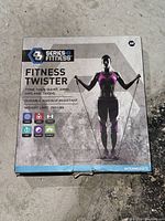 Front of the box showing Series 8 Fitness Twister branding and key features such as toning, cardio, strength, core, balance, and flexibility. Weight limit is 250 lbs, designed for intermediate level.