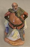 Front view of the Royal Doulton 'Falstaff' porcelain figurine