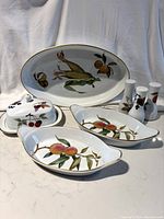 All porcelain items arranged on table showing full set