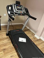 Full assembled treadmill in room