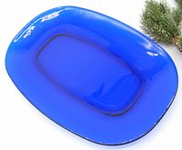 Top view of the cobalt blue Libbey serving tray showing smooth glossy finish, rounded corners, and vibrant color.