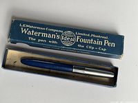 Vintage Waterman Ideal fountain pen in original blue box with silver metal cap and clip.